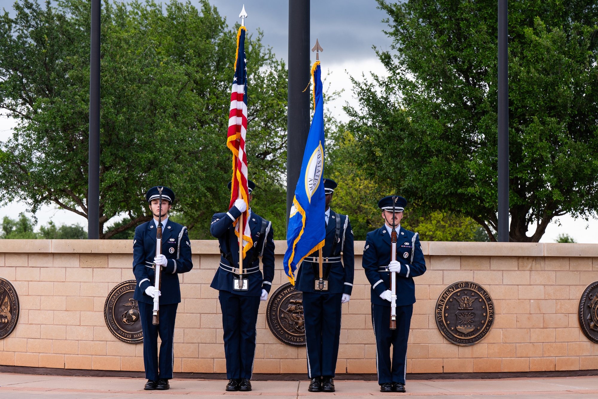 Members of the Dyess Air Force Base Honor Guard present the colors during a Memorial Day ceremony at the Texas State Veterans Cemetery at Abilene, Texas, May 25, 2026. The Dyess Chiefs' Group and the cemetery hosted the observance, drawing hundreds of local residents, veterans and military families to honor those who made the ultimate sacrifice. (U.S. Air Force photo by Senior Airman Jade M. Caldwell)