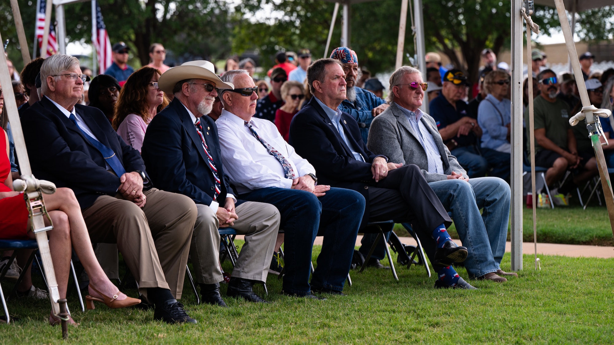 Abilene community and city leaders observe a Memorial Day ceremony at the Texas State Veterans Cemetery at Abilene, Texas, May 25, 2026. Military leaders, veterans and community members gathered for the annual remembrance ceremony to pay tribute to the fallen. (U.S. Air Force photo by Senior Airman Jade M. Caldwell)