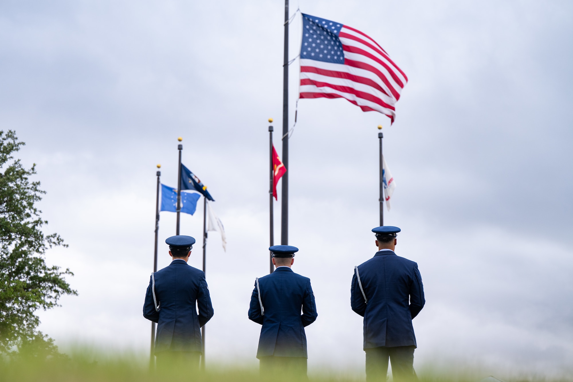 Members of the Dyess Air Force Base Honor Guard stand in formation prior to the firing of volleys during a Memorial Day ceremony at the Texas State Veterans Cemetery at Abilene, Texas, May 25, 2026. Military leaders, veterans and community members gathered for the annual remembrance ceremony to pay tribute to the fallen. (U.S. Air Force photo by Senior Airman Jade M. Caldwell)