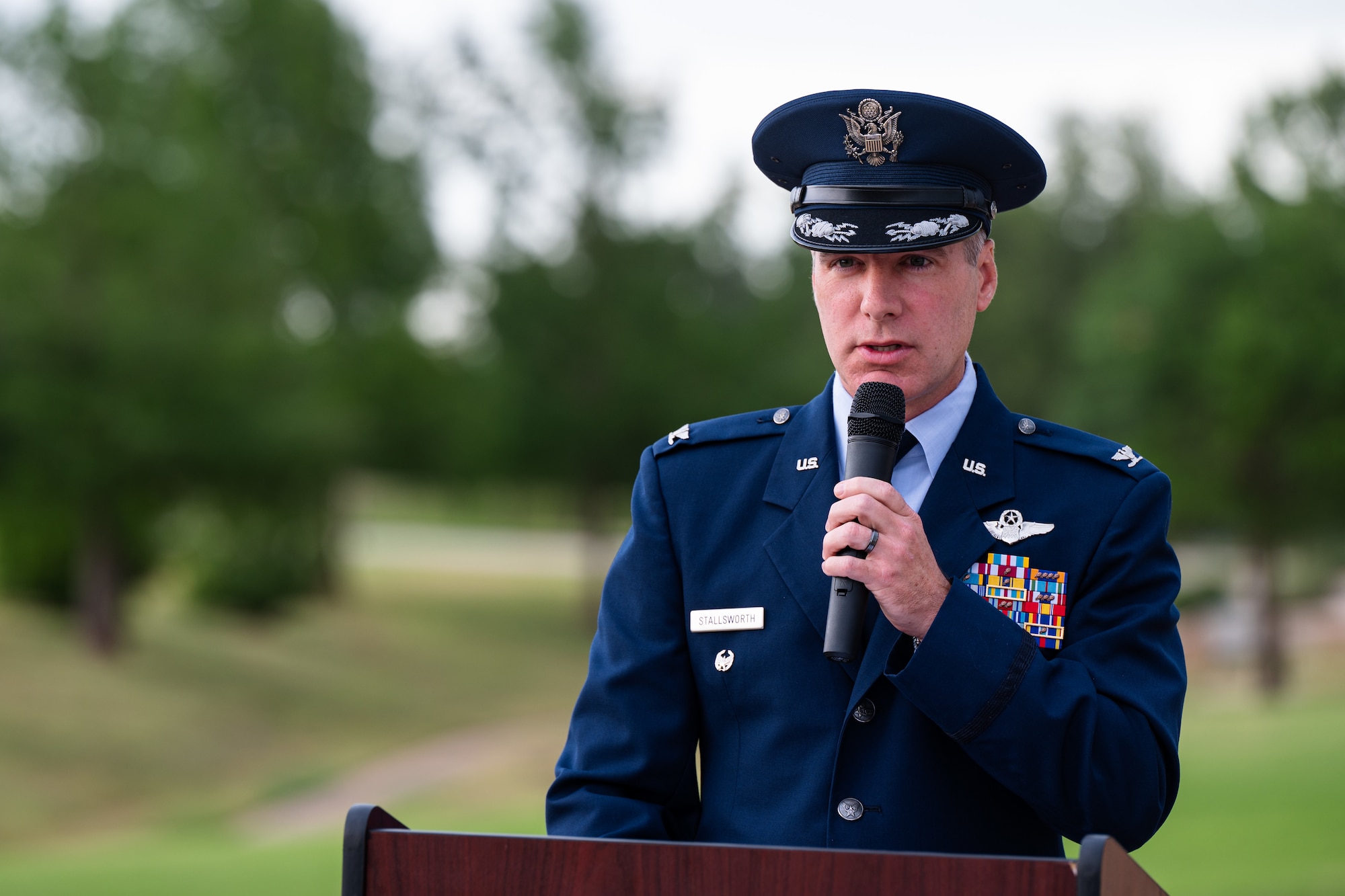 U.S. Air Force Col. Ryan Stallsworth, 7th Bomb Wing deputy commander, provides remarks during a Memorial Day ceremony at the Texas State Veterans Cemetery at Abilene, Texas, May 25, 2026. The outdoor observance drew hundreds of local residents, veterans and military families to the cemetery to honor those who made the ultimate sacrifice. (U.S. Air Force photo by Senior Airman Jade M. Caldwell)