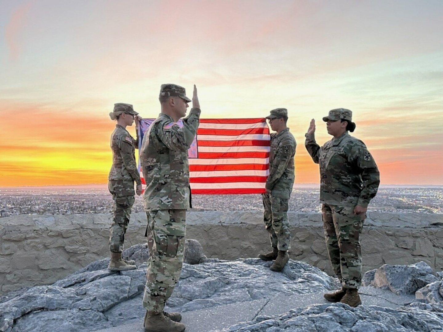 Army Capt. Nate Wilson conducts a re-enlistment oath to Army Sgt. Claria Bonilla overlooking El Paso Texas. Army Capt. Nate Wilson originally enlisted in the Navy at Pittsburgh MEPS and is set to retire as the Operations Officer of Pittsburgh MEPS in Summer 2026.