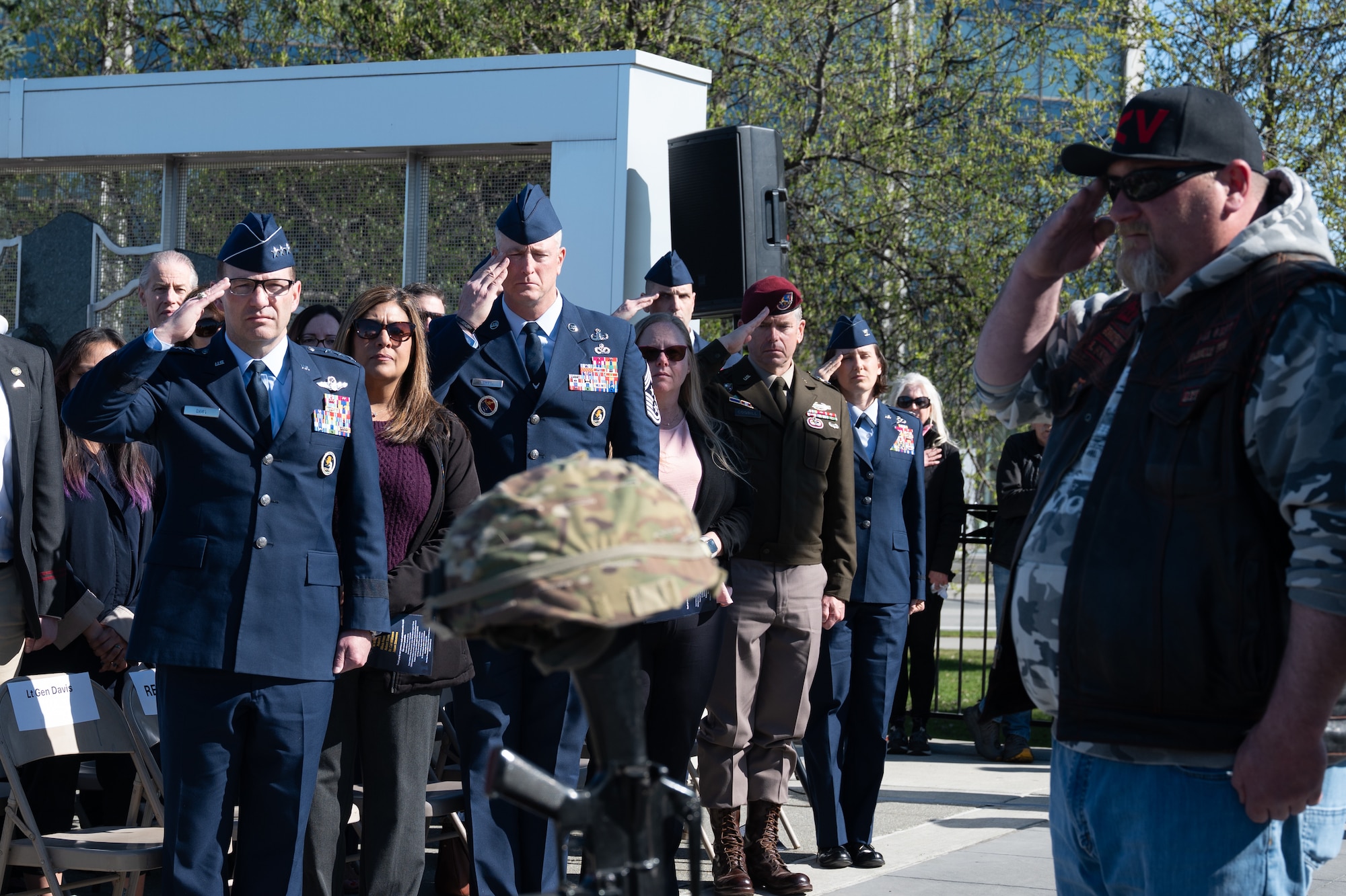 U.S. Air Force Lt. Gen. Robert Davis, 11th Air Force commander, and his wife Kathy; Chief Master Sgt. Heath Tempel, 11th Air Force command chief, and his wife Courtney; U.S. Army Maj. Gen. John Cogbill, 11th Airborne Division commander and U.S. Air Force Col. Lisa Mabbutt, 673d Air Base Wing and Joint Base Elmendorf-Richardson installation commander, salute a battlefield cross during the Anchorage Remembers Memorial Day Ceremony at the Delaney Park Strip Veterans Memorial in Anchorage, Alaska, May 25, 2026. The community-wide day of remembrance featured perspectives from local, state and federal officials. (U.S. Air Force photo by Airman 1st Class Theodore Gowdy)
