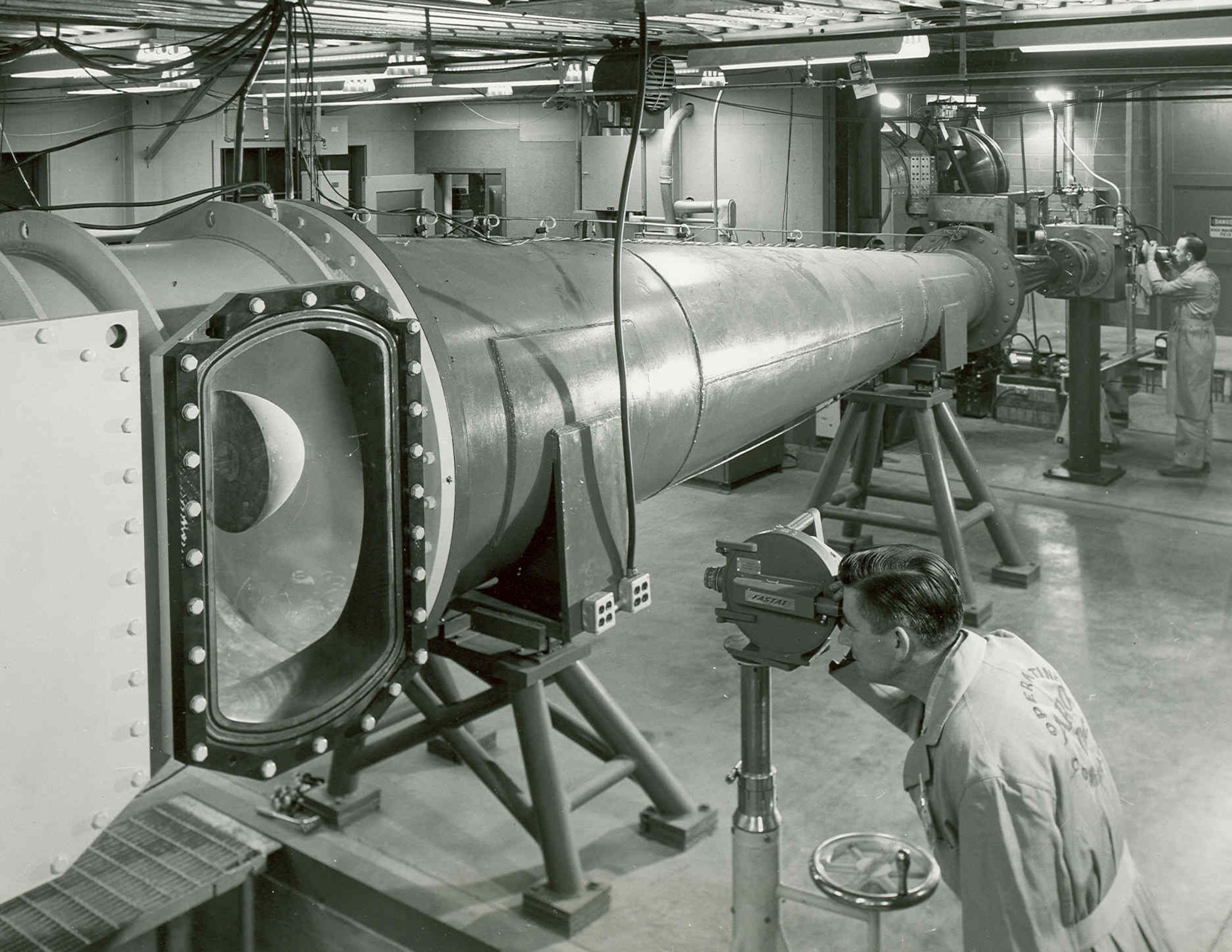 Technicians prepare to fire an arc-driven wind tunnel for testing in the Gas Dynamics Facility of what was then known as Arnold Engineering Development Center in 1958. The decision to proceed with a Gas Dynamics Facility at AEDC was made by representatives of the Air Force, Navy, National Advisory Committee for Aeronautics, the government’s Research Development Board and aircraft industry during a meeting in Washington, D.C., in early 1950. On Oct. 30, 1959, the Gas Dynamics Facility was dedicated as the von Kármán Gas Dynamics Facility in honor of mathematician, physicist and engineer Theodore von Kármán. Arnold Engineering Development Center is now known as Arnold Engineering Development Complex, headquartered at Arnold Air Force Base, Tenn. (U.S. Air Force photo)