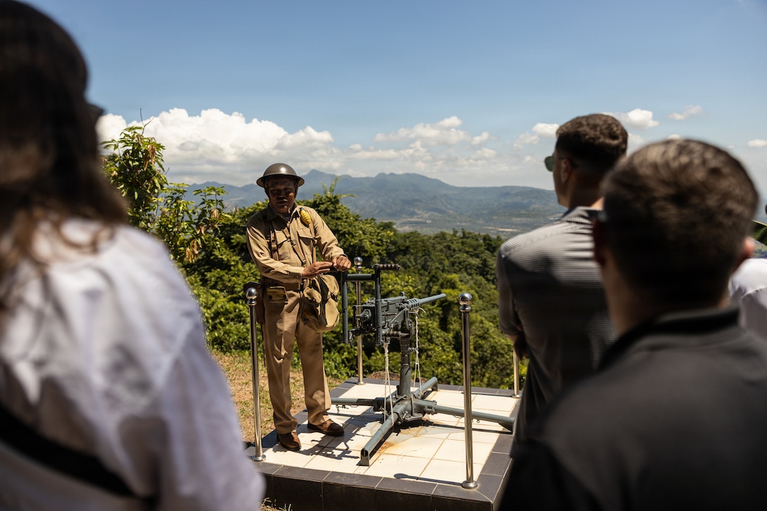 Mr. Rizaldy Mamuad, a museum curator  for the Mount Samat National Shrine of Valor, explains the history behind the Battle of Bataan and the Bataan Death March to U.S. Marines with Marine Rotational Force – Southeast Asia, I Marine Expeditionary Force, during a staff ride in honor of Memorial Day at Mount Samat National Shrine of Valor, Bataan, Philippines, May 23, 2026. MRF-SEA serves as I MEF’s forward command element, supporting Task Force - Philippines and integrating with the Armed Forces of the Philippines to strengthen interoperability and improve combined readiness. (U.S. Marine Corps photo by Cpl. Ryan Ramsammy)