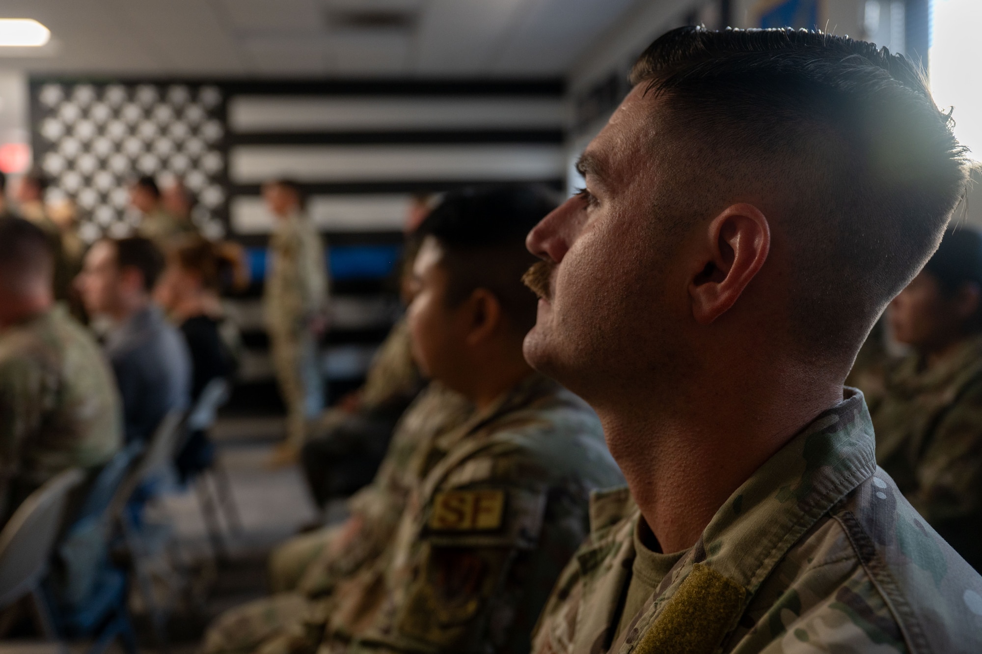 U.S. Air Force Airmen assigned to the 355th Security Forces Squadron attend the Final Guard Mount ceremony at Davis-Monthan Air Force Base, Arizona, May 21, 2026. The ceremony marked the conclusion of Police Week, a weeklong observance honoring Security Forces members and law enforcement personnel. (U.S. Air Force photo by Airman 1st Class Jaden Kidd)