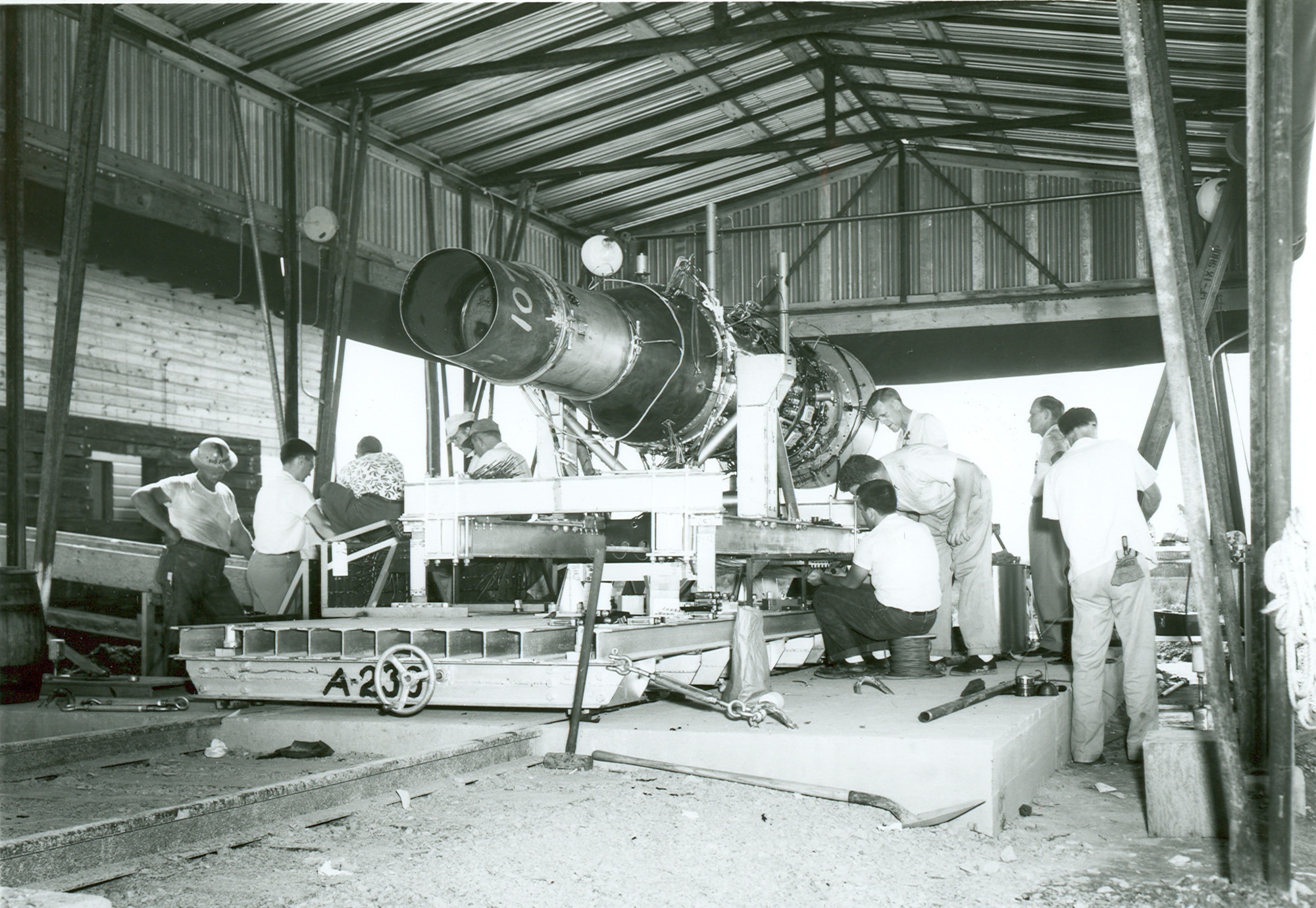 A J47 engine is prepared for open-air testing prior to being test fired in August 1953 at the Engine Test Facility of what was then known as the Arnold Engineering Development Center. The ETF was completed in 1953, and the J47 was the first engine fired at the facility. Arnold Engineering Development Center is now known as Arnold Engineering Development Complex, headquartered at Arnold Air Force Base, Tenn. (U.S. Air Force photo)