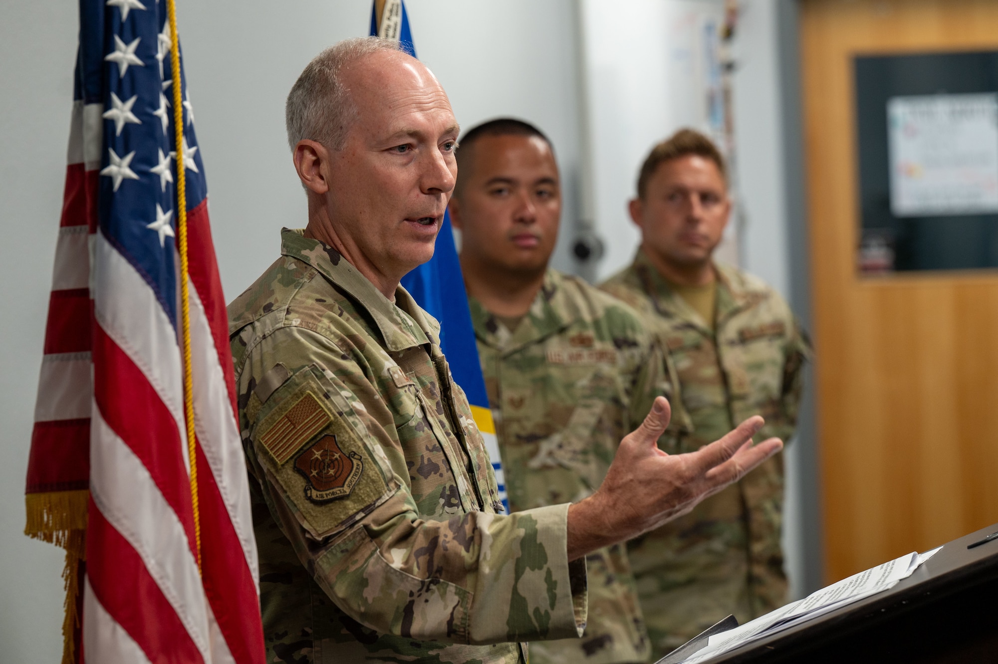 U.S. Air Force Col. Christopher Callus, Air Forces Southern director of international engagements and plans, requirements, programs and assessments, delivers closing remarks during the Final Guard Mount ceremony at Davis-Monthan Air Force Base, Arizona, May 21, 2026. Callus spoke about fallen defenders who impacted his career. (U.S. Air Force photo by Airman 1st Class Jaden Kidd)