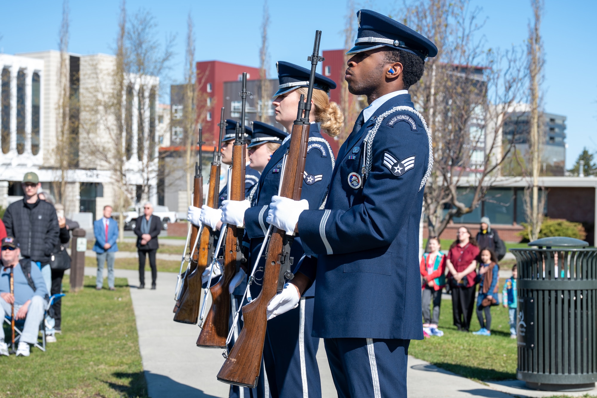 Members of the Joint Base Elmendorf-Richardson Honor Guard hold their rifles following a three-volley salute during the Anchorage Remembers Memorial Day Ceremony at the Delaney Park Strip Veterans Memorial in Anchorage, Alaska, May 25, 2026. The rendering of military honors concluded the formal portion of the event. (U.S. Air Force photo by Airman 1st Class Theodore Gowdy)