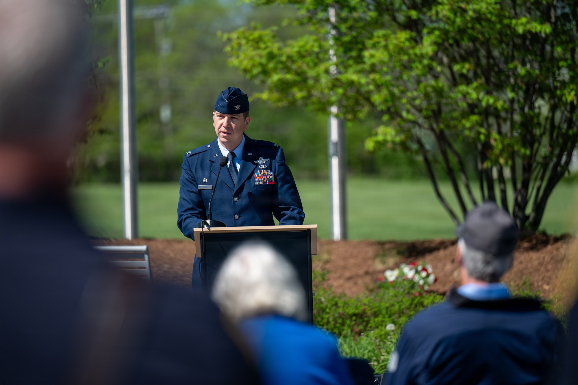 Photo of U.S. Air Force Col. Michael Blair, the Wing Commander of the 158th Fighter Wing, Vermont Air National Guard, delivering remarks during a Memorial Day ceremony in South Burlington Vt., May 22, 2026.