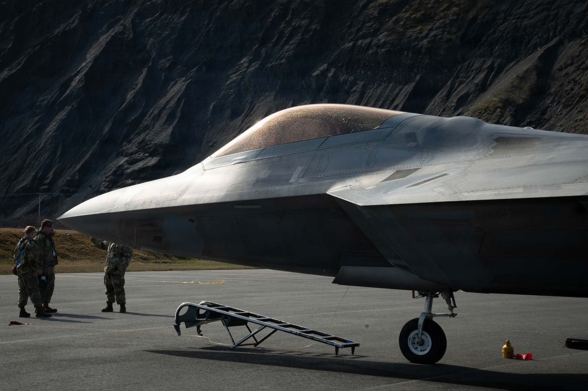 A U.S. Air Force F-22 Raptor aircraft assigned to the 3rd Wing stands by for post-flight checks and maintenance during exercise Tropic Tundra 26 at U.S. Coast Guard Air Station Kodiak, Alaska, May 12, 2026.