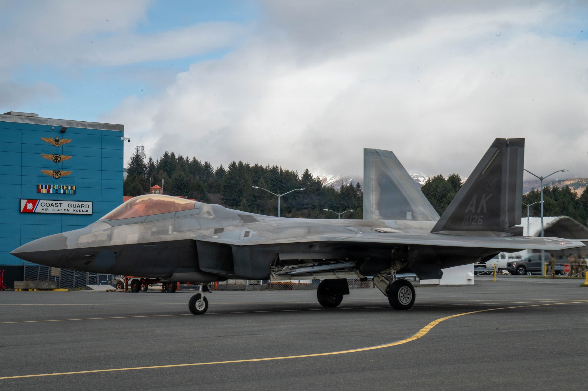 A U.S. Air Force F-22 Raptor aircraft assigned to the 3rd Wing stands by for post-flight checks during exercise Tropic Tundra 26 at U.S. Coast Guard Air Station Kodiak, Alaska, May 12, 2026.