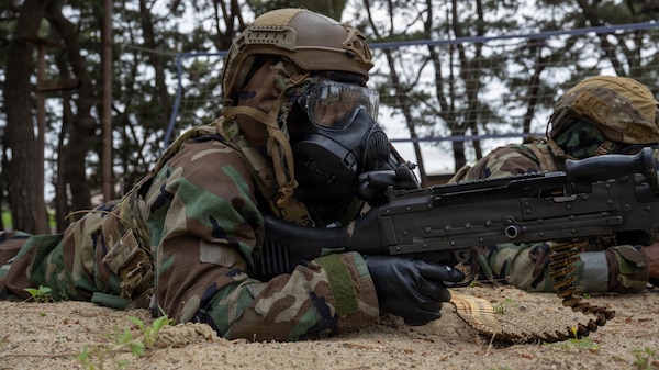 U.S. Airmen assigned to the 8th Fighter Wing, lay prone ready during an opposing force inject as part of exercise Beverly Sentinel 26-3 at Kunsan Air Base, Republic of Korea, May 19, 2026.