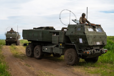 U.S. Marines with the 3rd Battalion, 12th Marine Regiment, 3rd Marine Division drive a High Mobility Artillery Rocket System into position before a training demonstration at the East Fuji Maneuver Area, Camp Fuji, Japan, May 20, 2026.