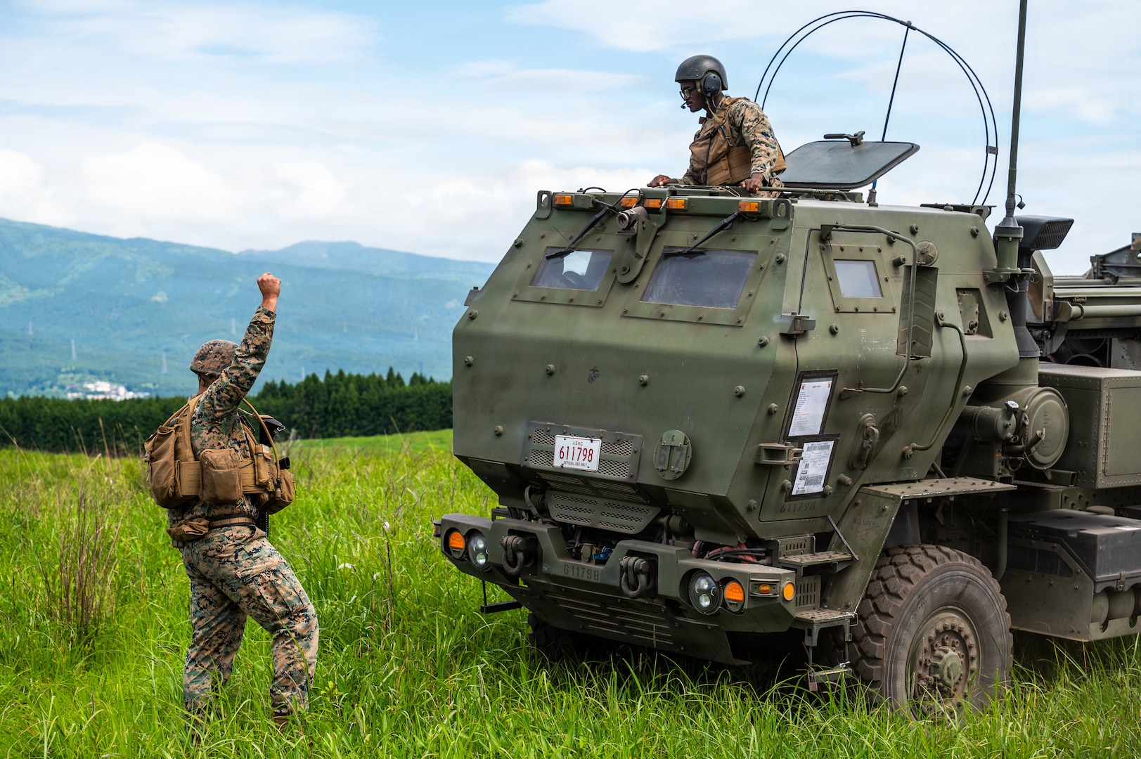 U.S. Marines with the 3rd Battalion, 12th Marine Regiment, 3rd Marine Division park a High Mobility Artillery Rocket System (HIMARS) during a training demonstration at the East Fuji Maneuver Area, Camp Fuji, Japan, May 20, 2026.