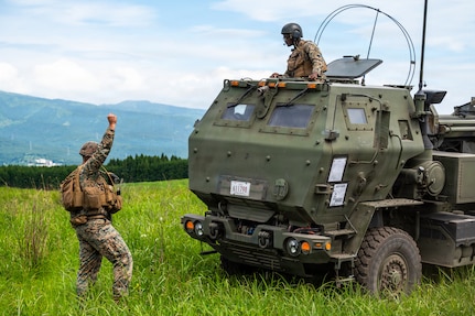 U.S. Marines with the 3rd Battalion, 12th Marine Regiment, 3rd Marine Division park a High Mobility Artillery Rocket System (HIMARS) during a training demonstration at the East Fuji Maneuver Area, Camp Fuji, Japan, May 20, 2026.
