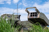 A High Mobility Artillery Rocket System (HIMARS) assigned to the 3rd Battalion, 12th Marine Regiment, 3rd Marine Division sits in a firing configuration during a training demonstration at the East Fuji Maneuver Area, Camp Fuji, Japan, May 20, 2026.