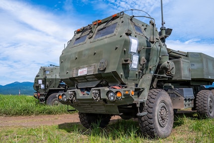 High Mobility Artillery Rocket Systems assigned to the 3rd Battalion, 12th Marine Regiment, 3rd Marine Division are parked during a training demonstration at the East Fuji Maneuver Area, Camp Fuji, Japan, May 20, 2026.