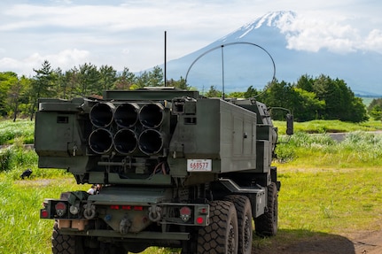 A High Mobility Artillery Rocket System assigned to the 3rd Battalion, 12th Marine Regiment, 3rd Marine Division is parked during a training demonstration at the East Fuji Maneuver Area, Camp Fuji, Japan, May 20, 2026.