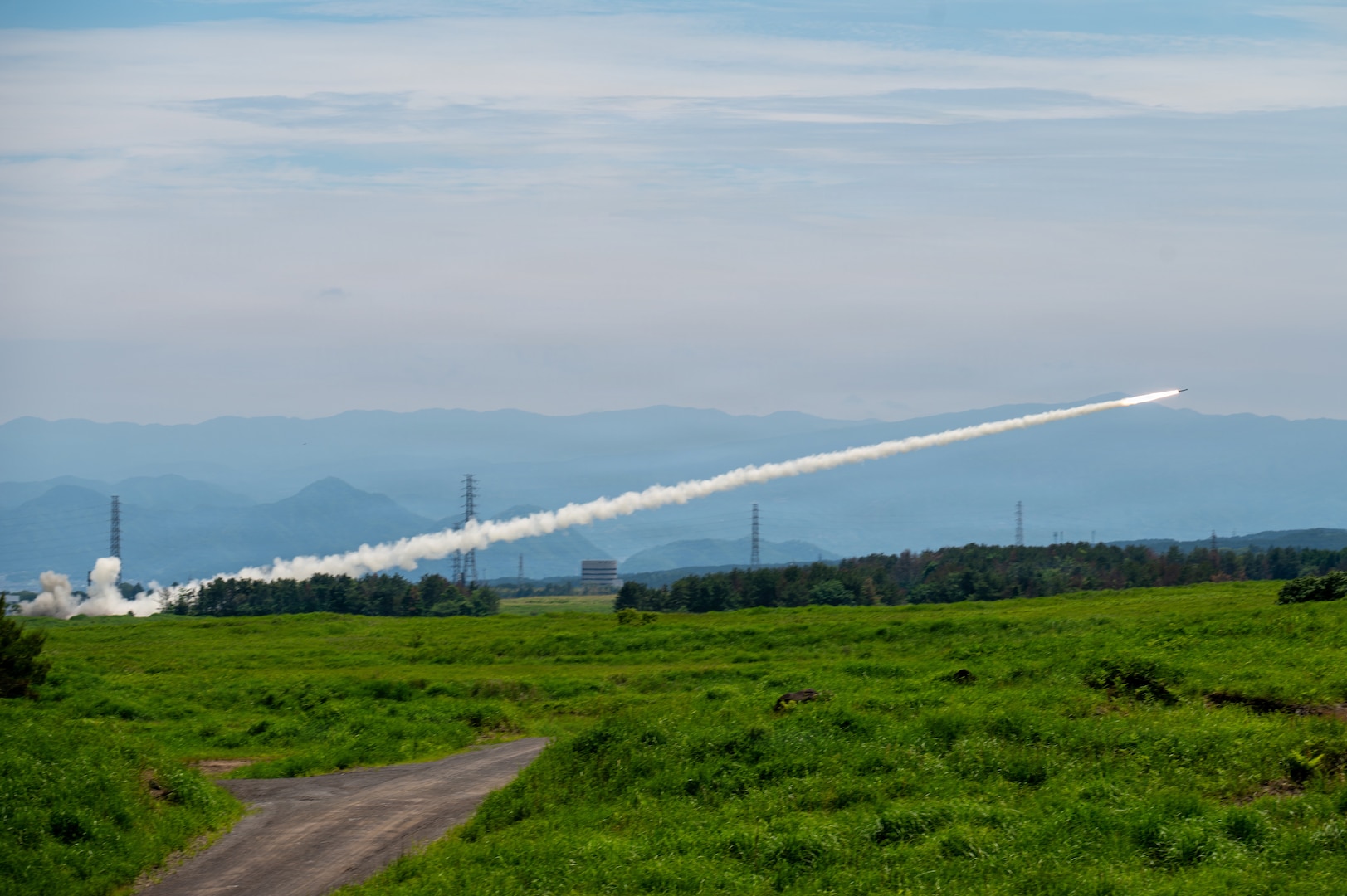 U.S. Marines with 3rd Battalion, 12th Marine Regiment, 3rd Marine Division execute a High Mobility Artillery Rocket System live-fire training event at the East Fuji Maneuver Area, Camp Fuji, Japan, May 20, 2026.