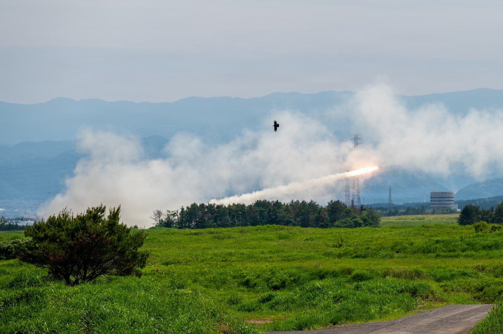 U.S. Marines with 3rd Battalion, 12th Marine Regiment, 3rd Marine Division execute a High Mobility Artillery Rocket System live-fire training event at the East Fuji Maneuver Area, Camp Fuji, Japan, May 20, 2026.