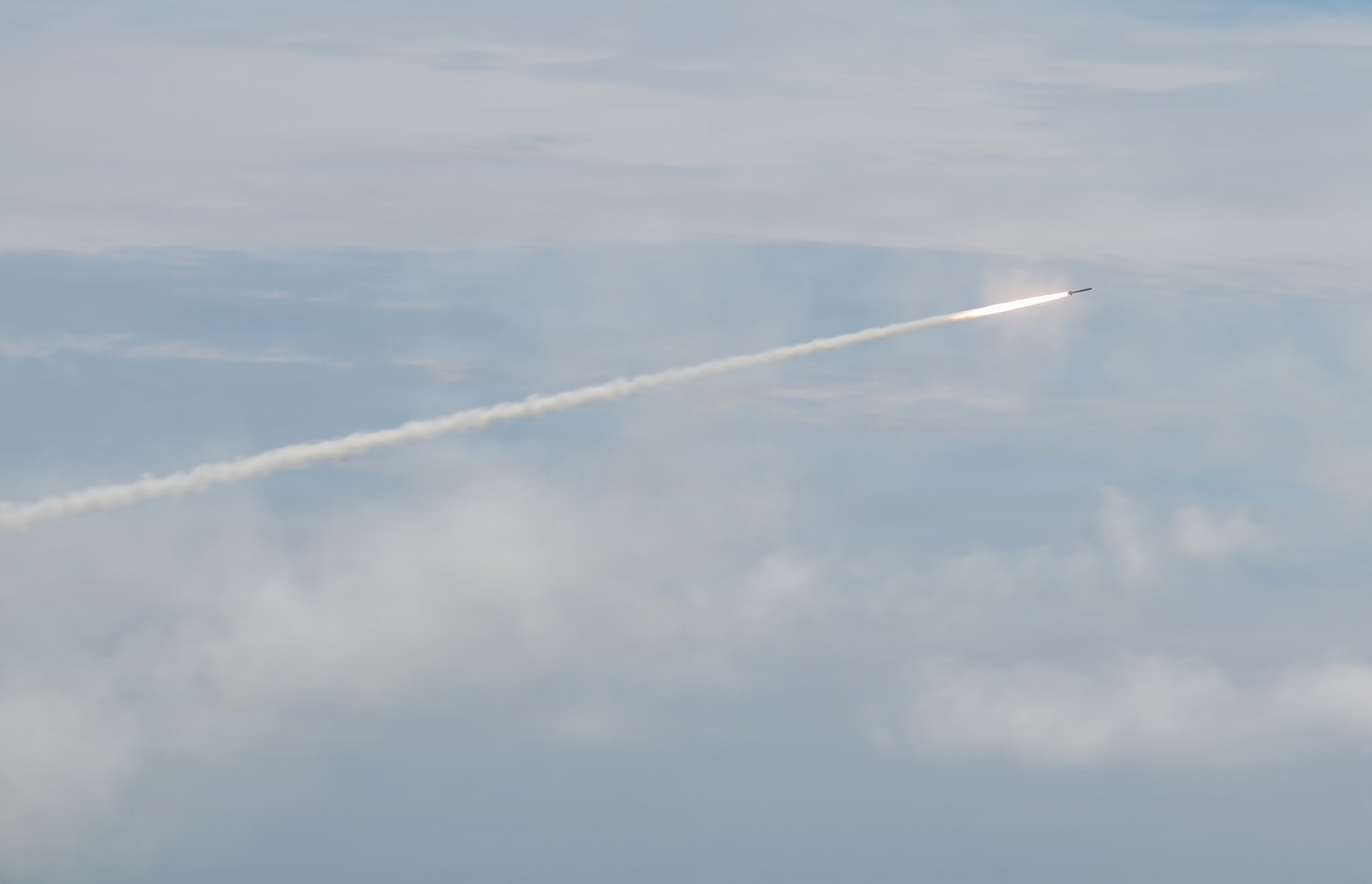 A rocket fired by a High Mobility Artillery Rocket System assigned to the U.S. Marine Corps 3rd Battalion, 12th Marine Regiment, 3rd Marine Division flies during a live-fire training event at the East Fuji Maneuver Area, Camp Fuji, Japan, May 20, 2026.