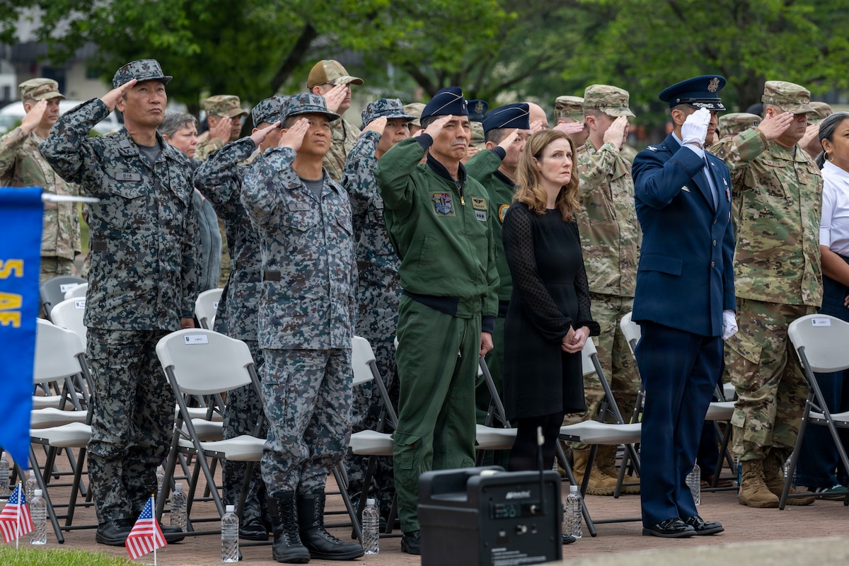 U.S. Air Force and Japan Self-Defense Force service members participate in a Memorial Day retreat ceremony at Misawa Air Base, Japan, May 21, 2026.