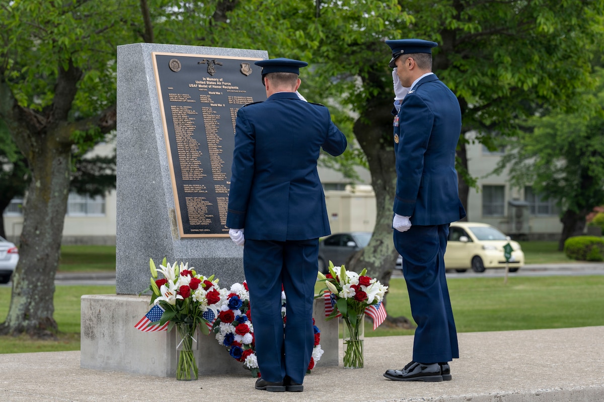 U.S. Air Force Col. Paul Davidson, left, 35th Fighter Wing (FW) commander, and Col. Bryan Wong, 35th Maintenance Group commander, participate in a Memorial Day retreat ceremony at Misawa Air Base, Japan, May 21, 2026.