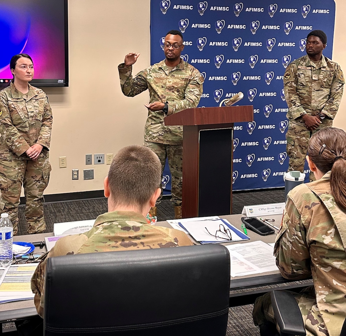 Airman presents idea to panel