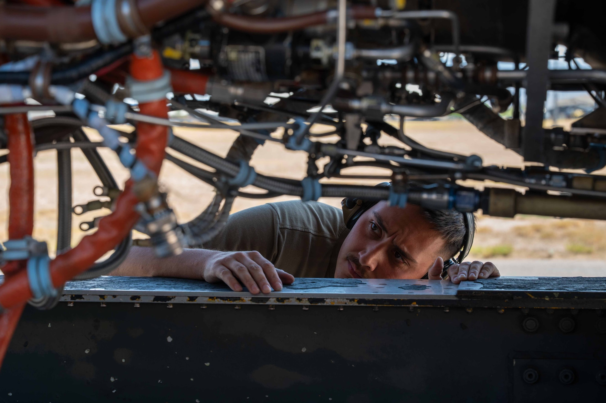 Airman 1st Class Gabriel Medina, an aerospace propulsion journeyman assigned to the 355th Component Maintenance Squadron, ensures an A-10C Thunderbolt II engine is running correctly at Davis-Monthan Air Force Base.