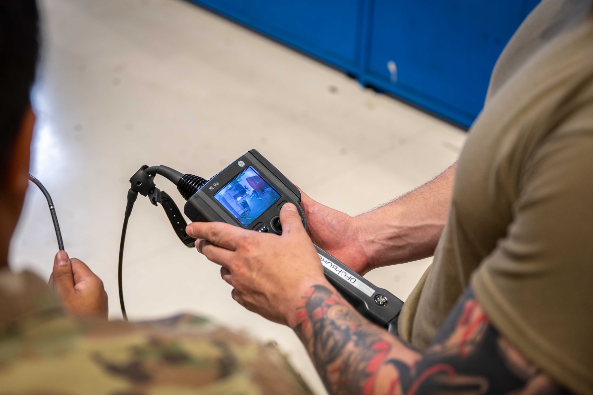 An Airman performs maintenance on a A-10 engine.