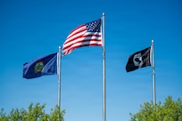 Photo of Flags blowing in the wind during a memorial day ceremony in South Burlington Vt., May 22, 2026.