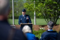 Photo of U.S. Air Force Col. Michael Blair, the Wing Commander of the 158th Fighter Wing, Vermont Air National Guard, delivering remarks during a Memorial Day ceremony in South Burlington Vt., May 22, 2026.