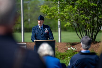 Photo of U.S. Air Force Col. Michael Blair, the Wing Commander of the 158th Fighter Wing, Vermont Air National Guard, delivering remarks during a Memorial Day ceremony in South Burlington Vt., May 22, 2026.
