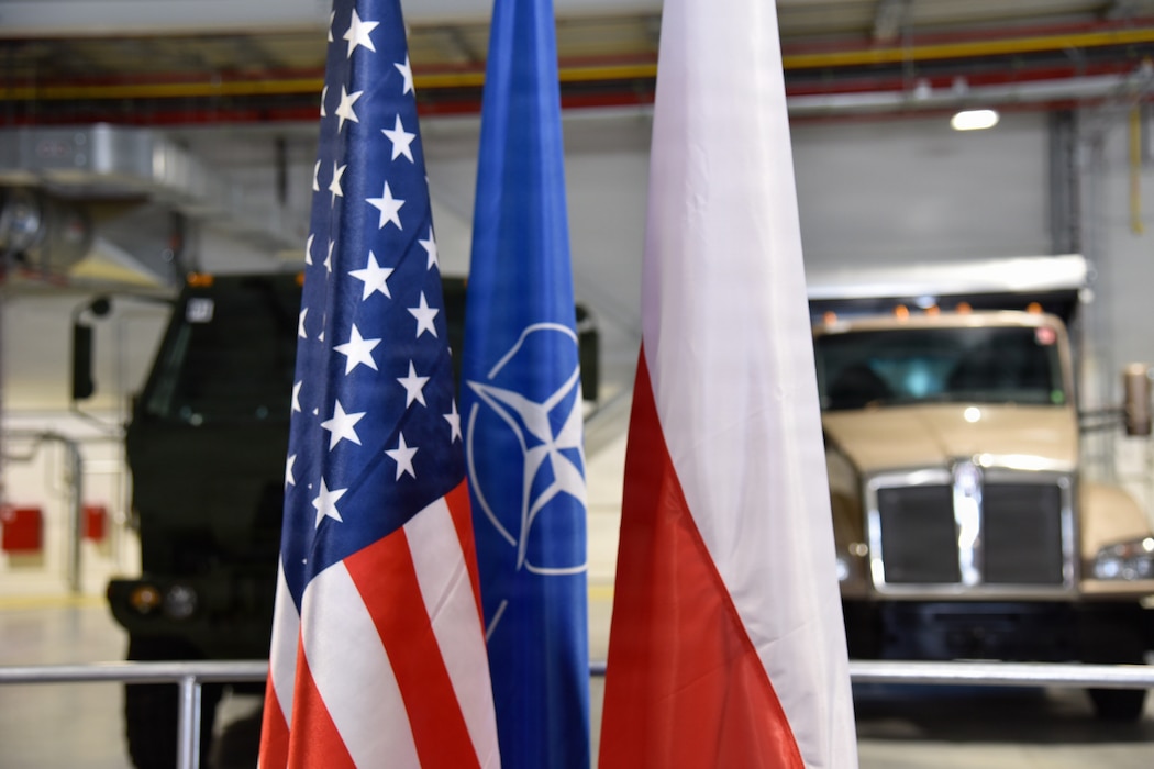 U.S. flag, NATO flag, and Poland flag