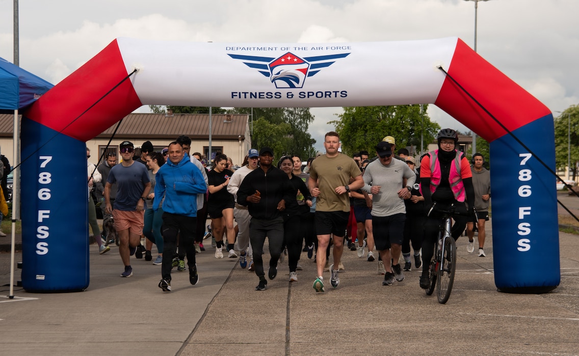 runners participate in 5k run