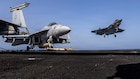 An F-35C Lightning II, attached to Marine Fighter Attack Squadron (VMFA) 314, prepares to make an arrested landing on the flight deck of Nimitz-class aircraft carrier USS Abraham Lincoln (CVN 72), May 25, 2026. Abraham Lincoln is deployed to the U.S. 5th Fleet area of operations to support maritime security and stability in the Middle East. (U.S. Navy photo)