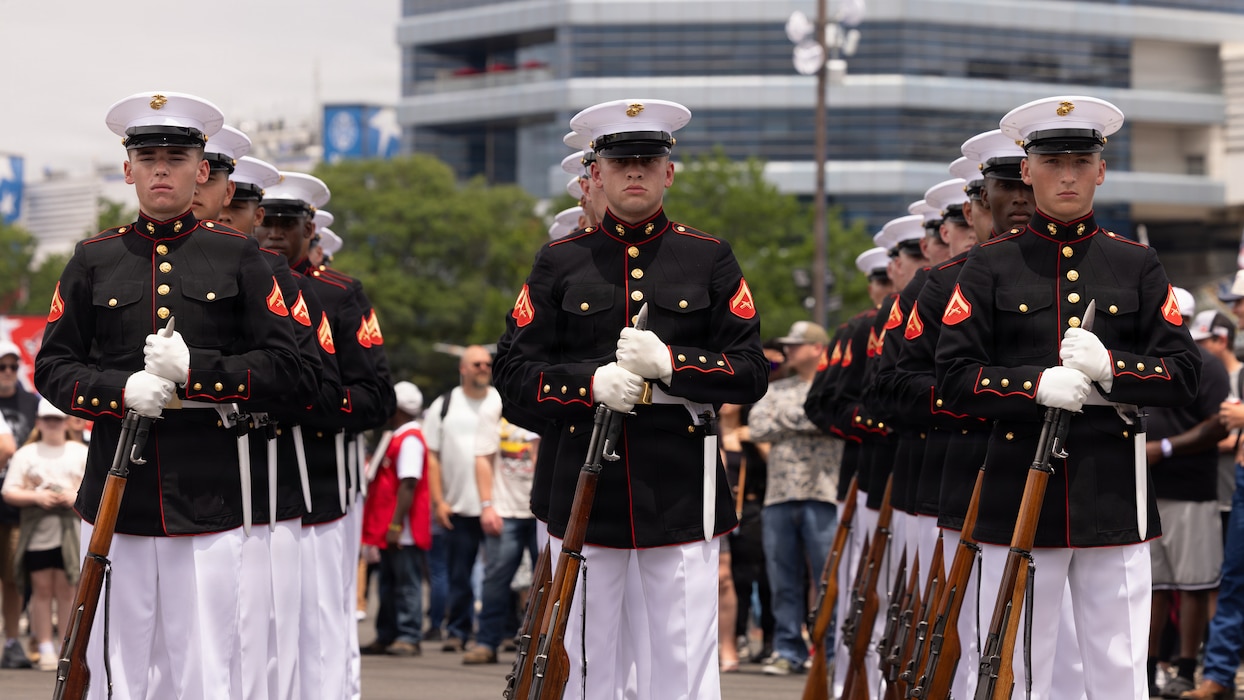 U.S. Marines with the United States Marine Corps Silent Drill Platoon, Alpha Company, Marine Barracks Washington, stand in formation in Concord, North Carolina, May 24, 2026. The U.S. Marine Corps supported the Coca-Cola 600, a NASCAR race held during Memorial Day weekend, with static displays of military aircraft and vehicles and participation in ceremonies. (U.S. Marine Corps photo by Lance Cpl. Michael Robinson)