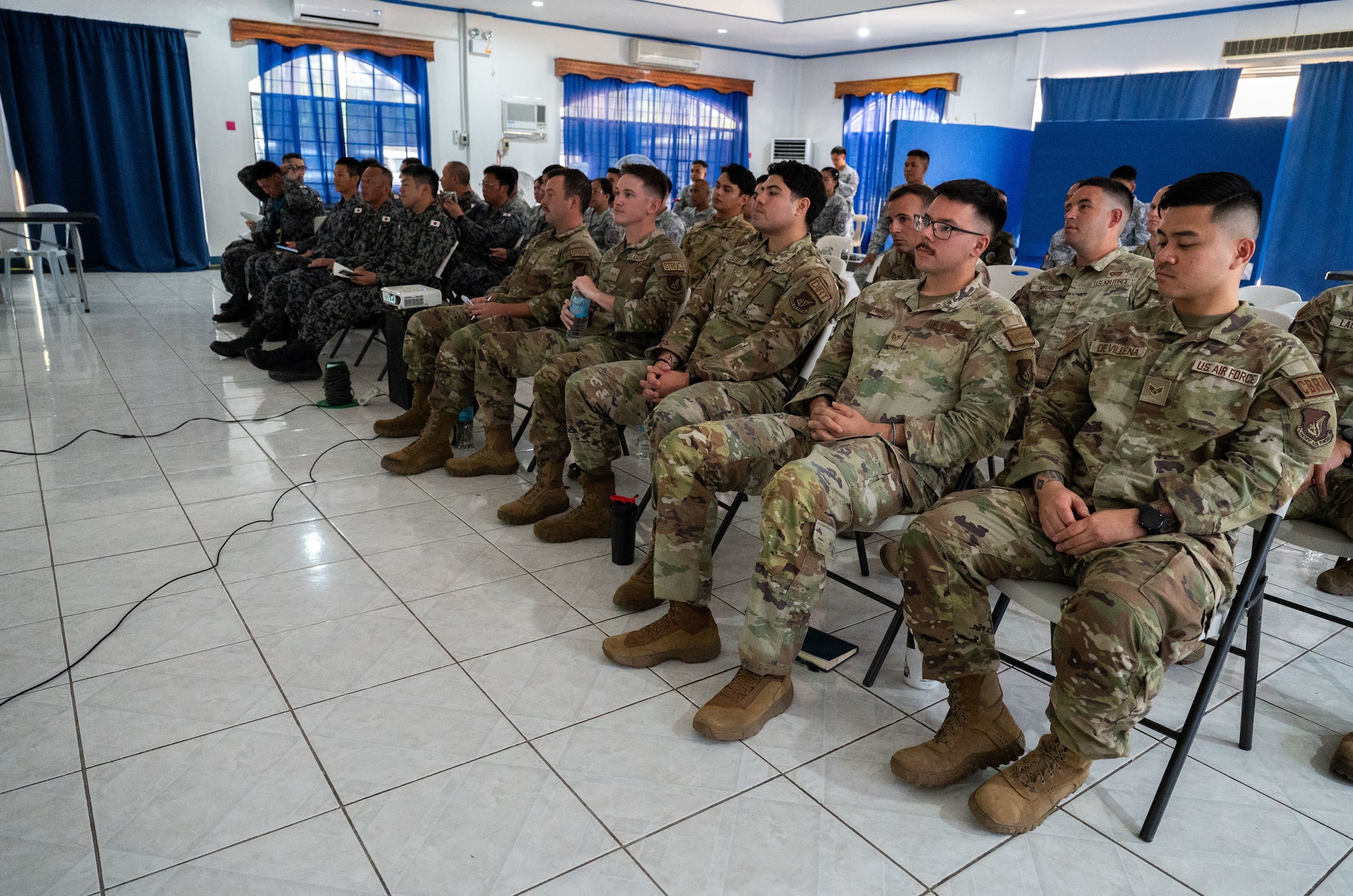 U.S. Airmen assigned to the 21st Combat Air Base Squadron, Japanese Air Self-Defense Force airmen and Philippine Air Force airmen participate in a subject-matter expert exchange during Exercise Balikatan 2026 at Basa Air Base, Philippines, May 4, 2026. Balikatan is a longstanding annual exercise between the Armed Forces of the Philippines and U.S. military designed to strengthen our ironclad alliance, improve our capable combined force and demonstrate our commitment to regional security and stability. (U.S. Air Force photo by Senior Airman Alondra Cristobal Hernandez)