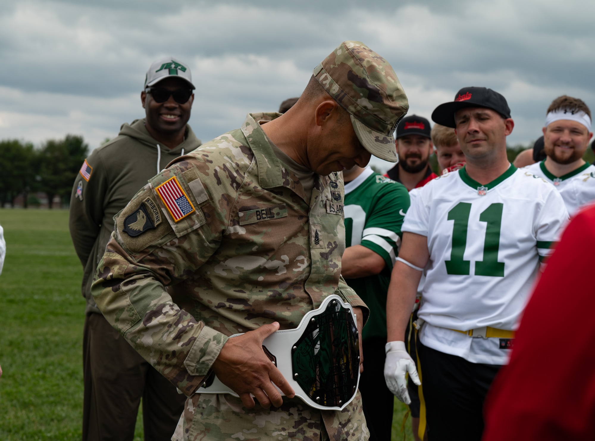 U.S Army Command Sgt. Maj. Stonnie Bell Jr., U.S. Army Support Activity Fort Dix command sergeant major, puts on the champion’s belt after the British army vs. Joint Base McGuire-Dix-Lakehurst flag football game at JB MDL, N.J., May 6, 2026. JB MDL won the international showdown with a final score of 44-18. (U.S. Air Force photo by Airman 1st Class Haeleigh Bayle)