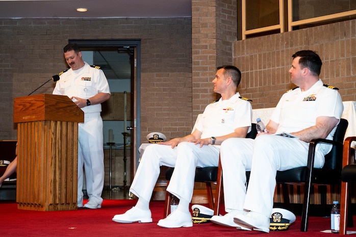 A photo of a man delivering a speech.