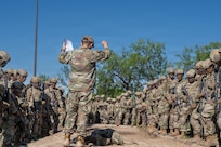 Defenders train over obstacles