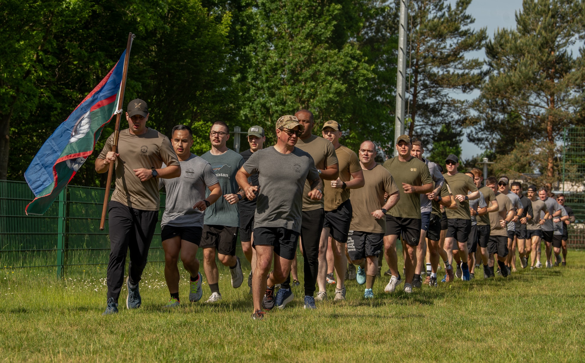 U.S. service members stand at attention