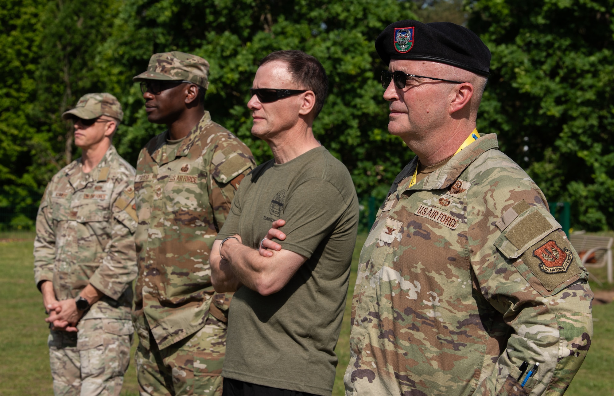 U.S. service members stand at attention