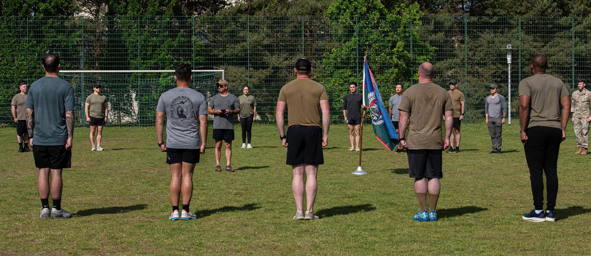 U.S. service members stand at attention