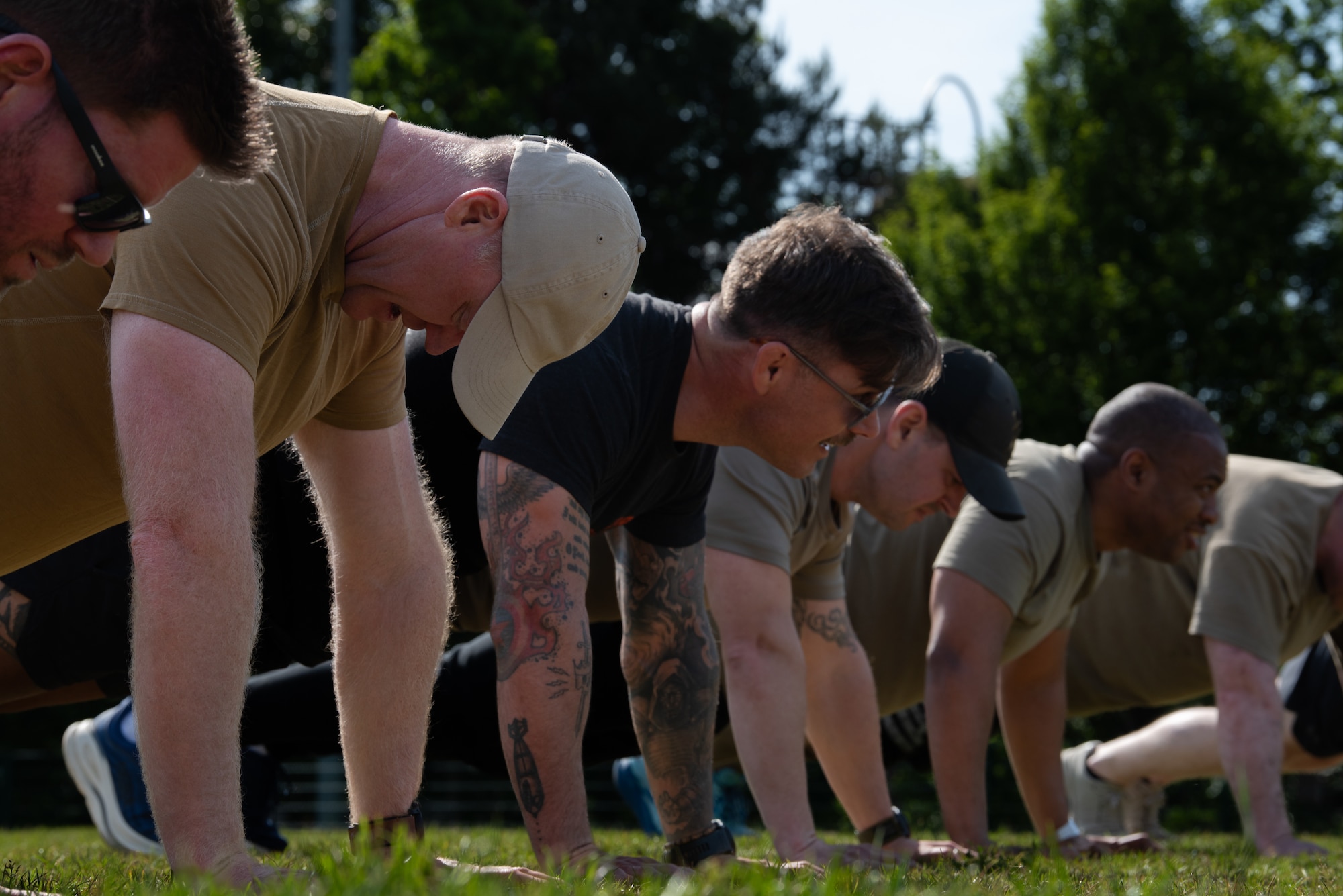 U.S. service members perform push-ups