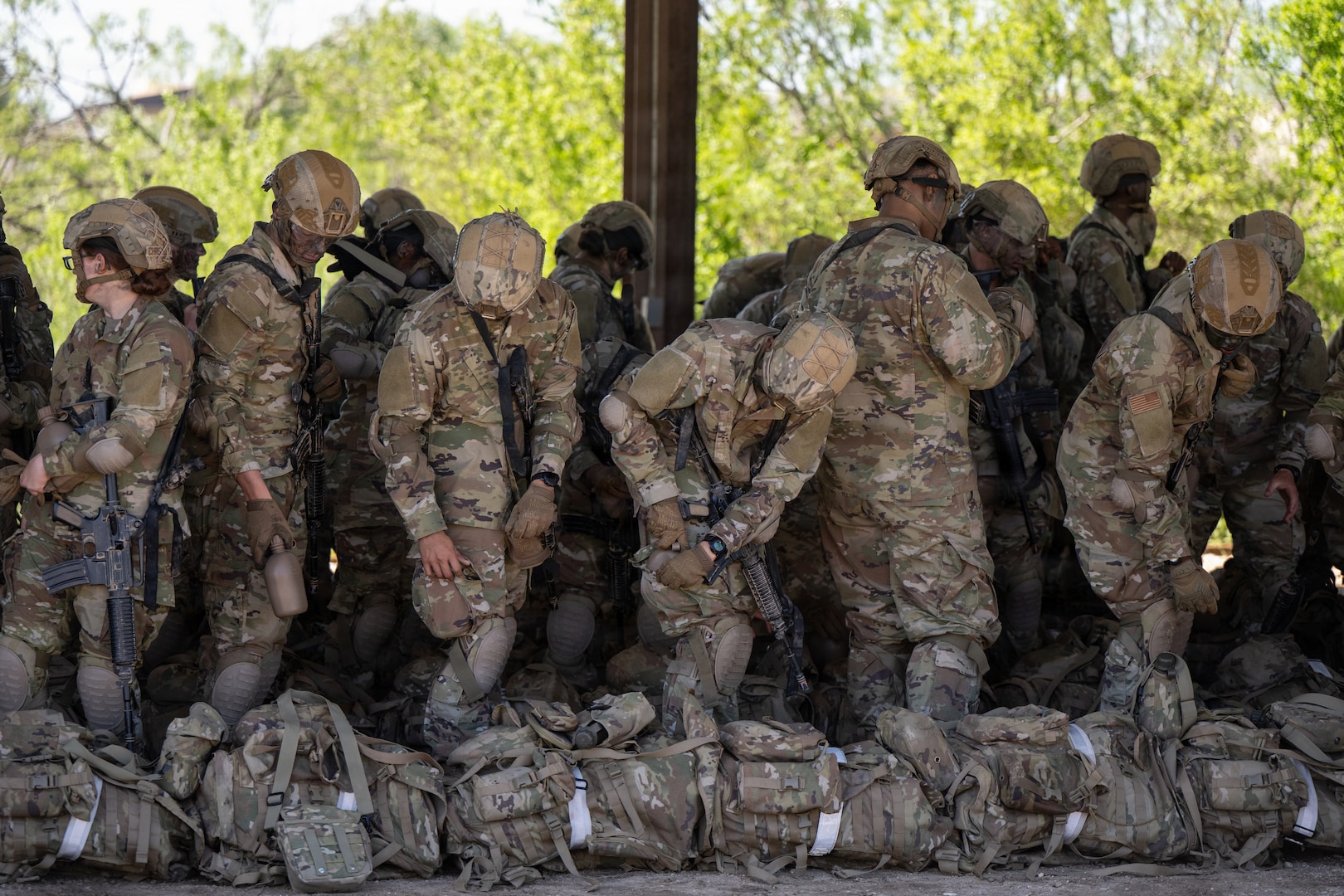 Defenders train over obstacles
