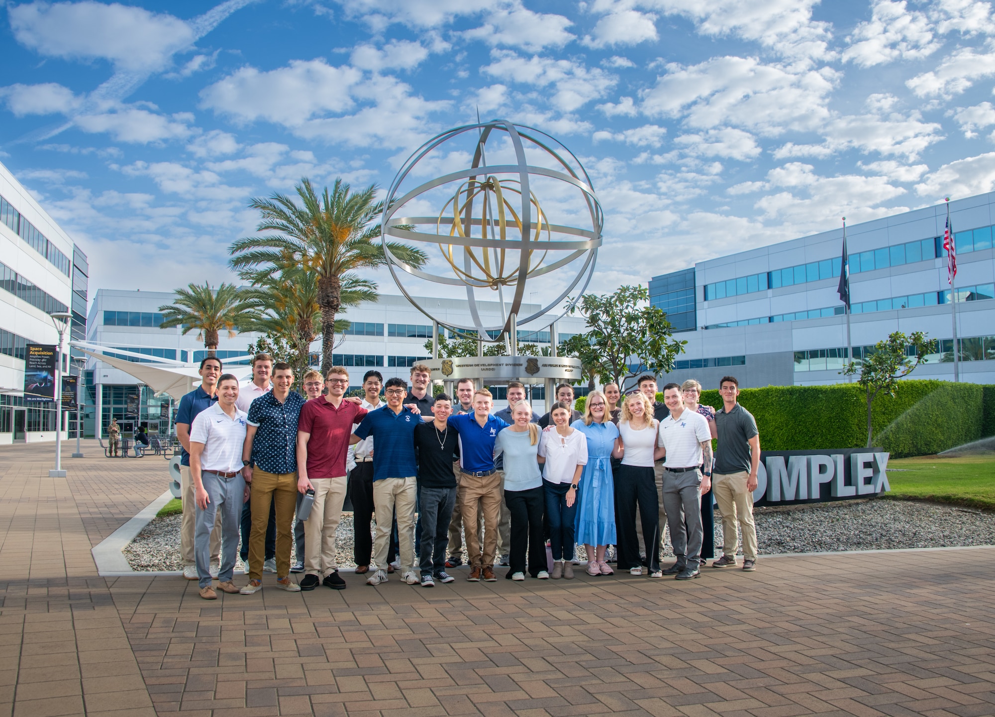 Cadets from the United States Air Force Academy (USAFA) stand together in the courtyard of Space Systems Command (SSC) headquarters at Los Angeles Air Force Base, April 10, 2026. These future leaders from Cadet Squadron 09, ranging from “Firsties” (seniors) to “third-class cadets” (sophomores), traveled from their Colorado Springs, Colo. campus to gain a deeper understanding of the U.S. Space Force mission and the role of SSC in maintaining our nation’s superiority in the space domain.
