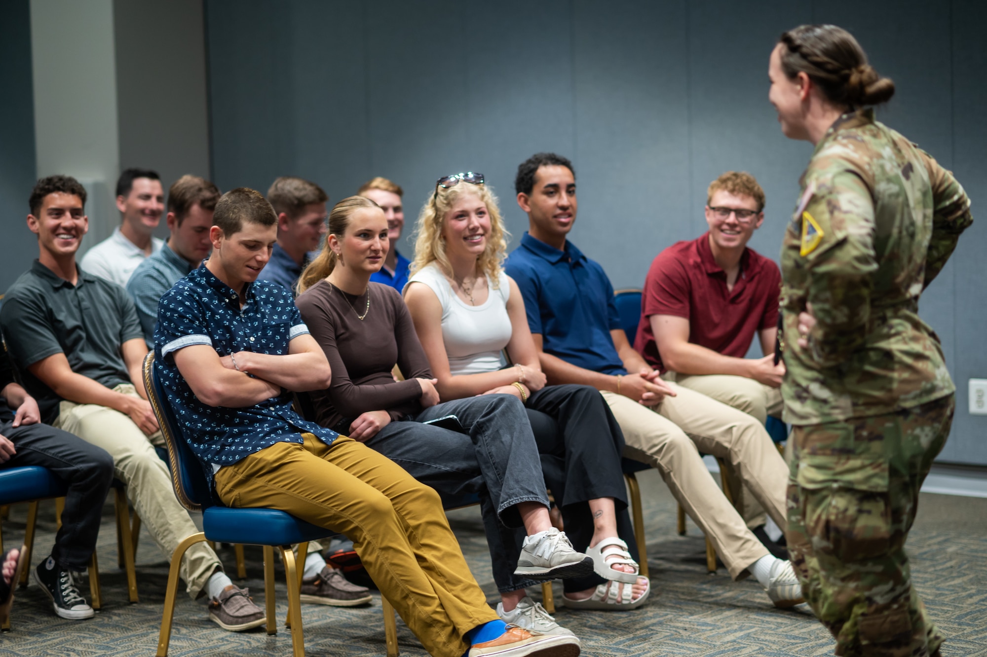 Visiting cadets from the United States Air Force Academy (USAFA) Cadet Squadron 09 listen to remarks from U.S. Space Force Capt. McKenna Medina at Space Systems Command (SSC), Los Angeles Air Force Base, April 10, 2026. The Cadets attended tours and presentations arranged by Capt. Medina, herself a graduate of USAFA, to provide a clearer window into the Space Force mission and the diverse yet critical mission sets under the umbrella of SSC.