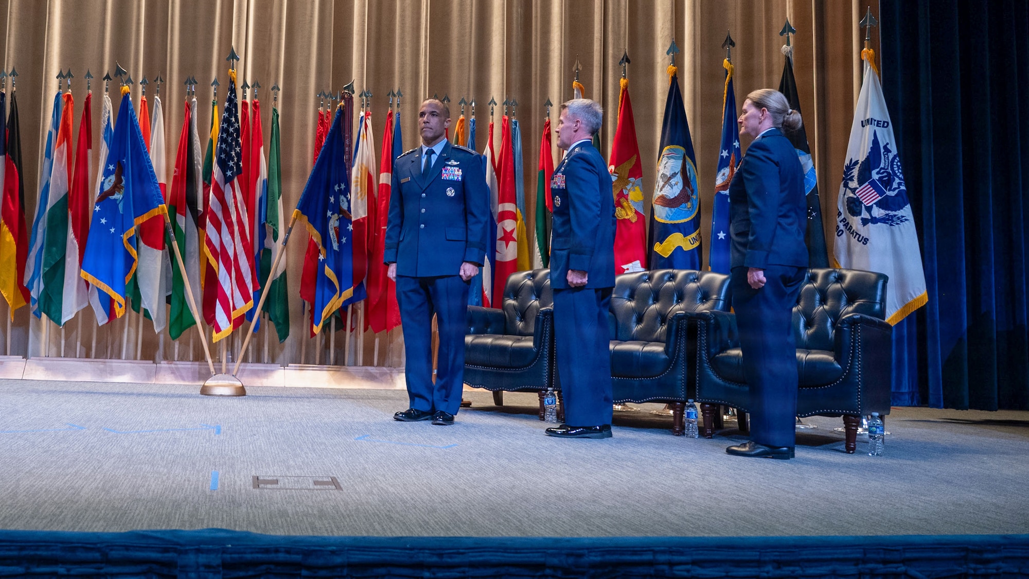 Students from Air War College present a memento from the academic class of 2026 to Brig. Gen. Jocelyn Schermerhorn, AWC commander, during the graduation ceremony for Air War College at Maxwell Air Force Base, Alabama, May 14, 2026. The graduating class consisted of officers from all military branches of the U.S. military, civilian employees of federal government agencies, and officers from international allies and partner nations. (U.S. Air Force photos by Senior Airman Tanner Doerr)