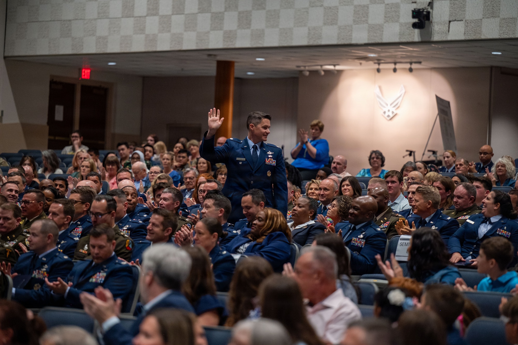 Students from Air War College present a memento from the academic class of 2026 to Brig. Gen. Jocelyn Schermerhorn, AWC commander, during the graduation ceremony for Air War College at Maxwell Air Force Base, Alabama, May 14, 2026. The graduating class consisted of officers from all military branches of the U.S. military, civilian employees of federal government agencies, and officers from international allies and partner nations. (U.S. Air Force photos by Senior Airman Tanner Doerr)